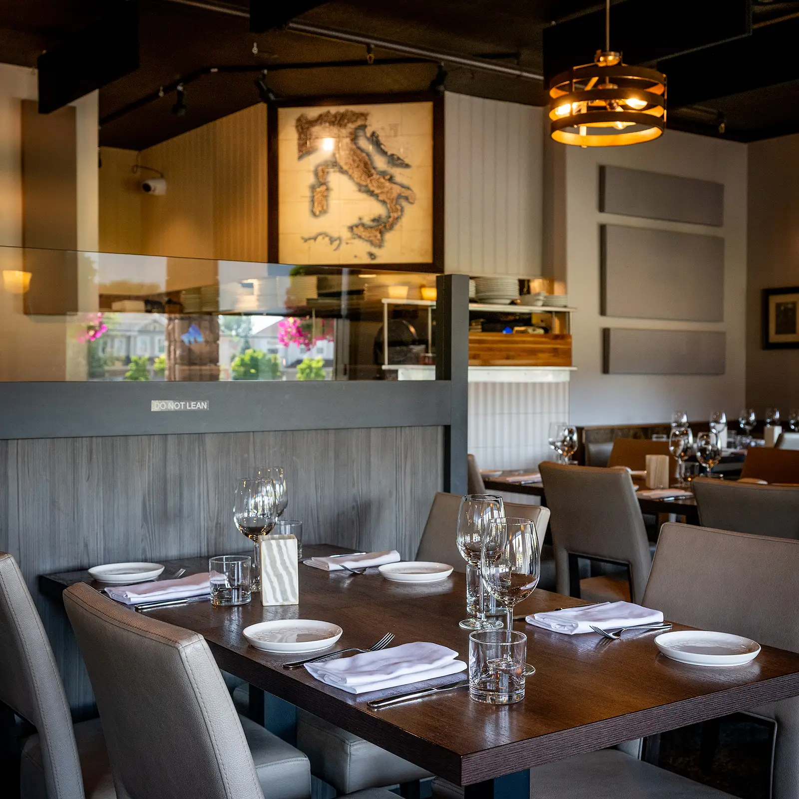 Elegant warmly lit restaurant dining room