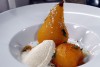 Saffron poached pears with a lemon brandy flambé