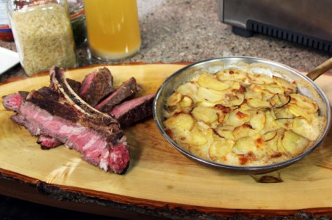 Rib steak with scalloped‎ potato & mint cucumber salad
