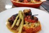Roasted spiced chicken with stuffed tomatoes and five lilies sauce