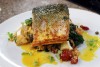 Atlantic salmon with citrus couscous and saffron wine sauce