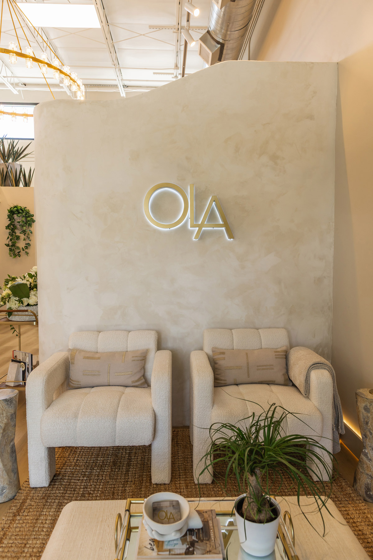 two couches and ola logo