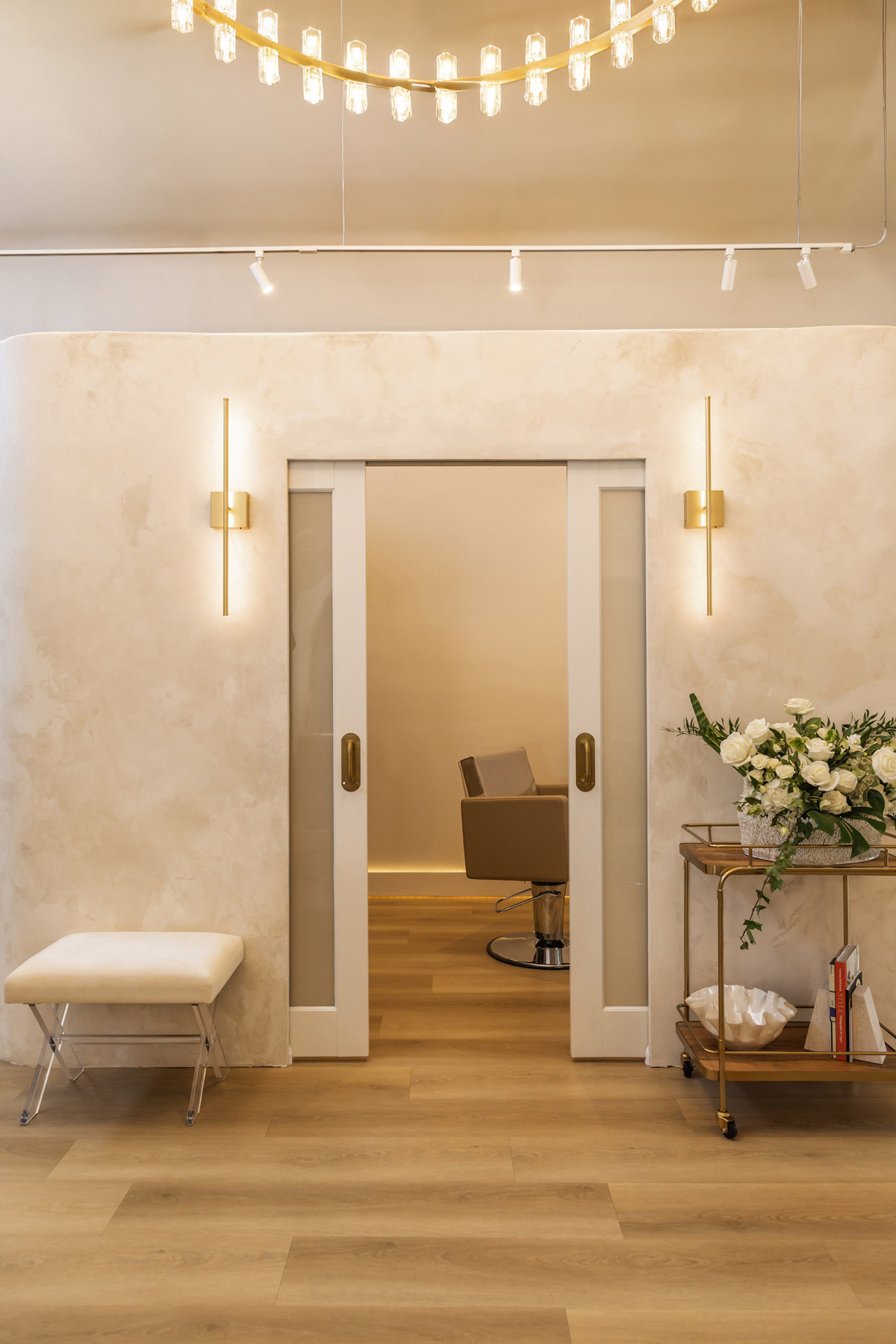 Inside look of salon with chandelier